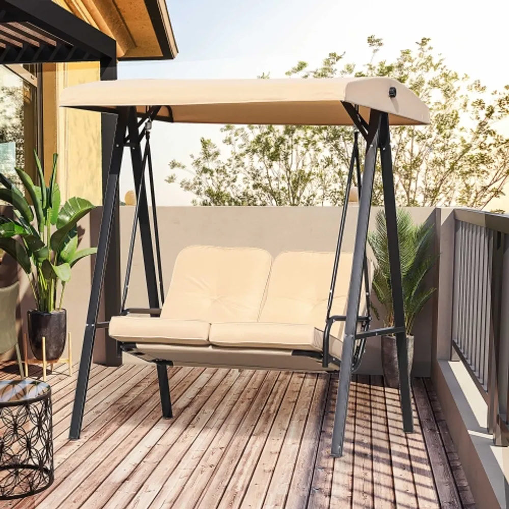Covered outdoor top swinging lounger