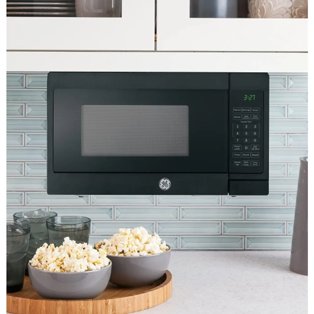 GE 0.7 cu. ft. Small Countertop Microwave Oven Includes Optional