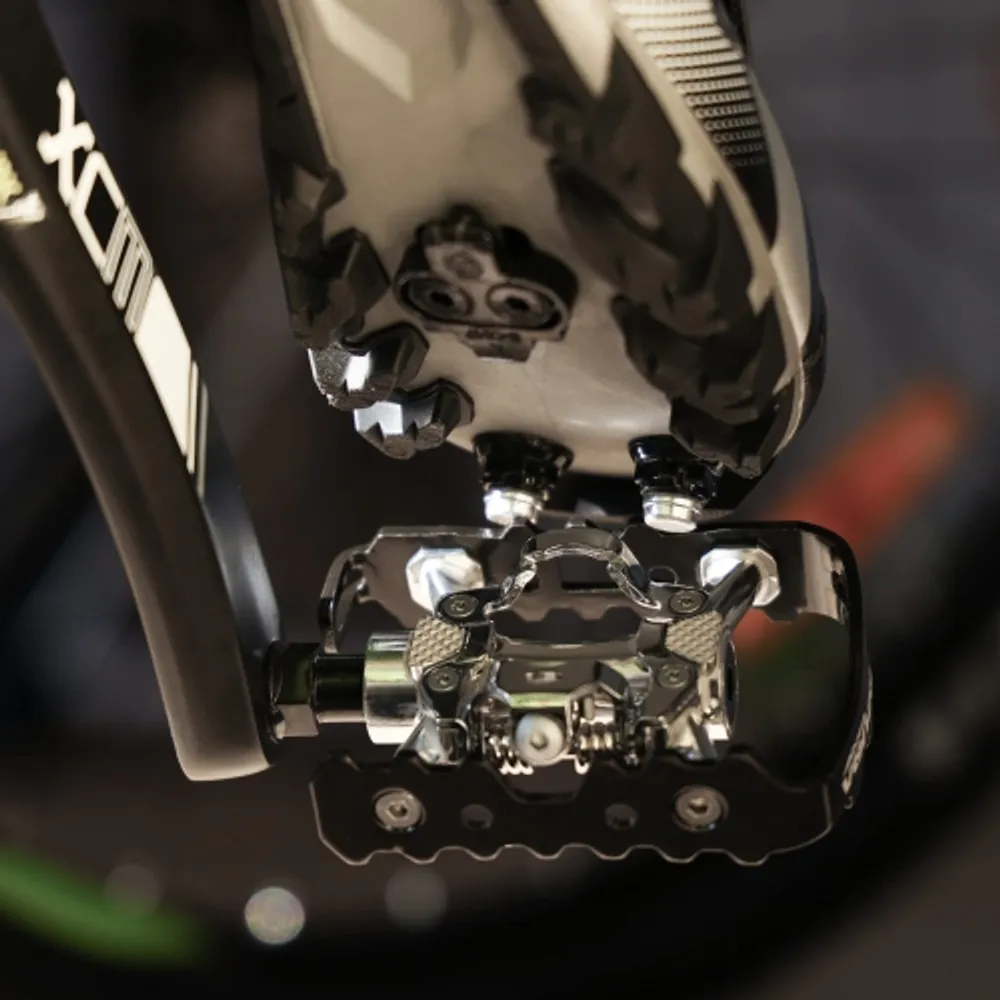 Dual platform pedals for mountain bike store
