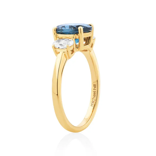 Peoples 5.0mm Lab Created Blue Sapphire and 0.089 CT. T.W. Diamond