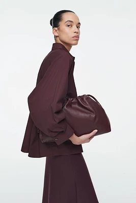 Cos MINI CAVATELLI CLUTCH BAG - STRAW | King's Cross