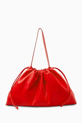 Cos CAVATELLI CLUTCH BAG - STRAW | King's Cross