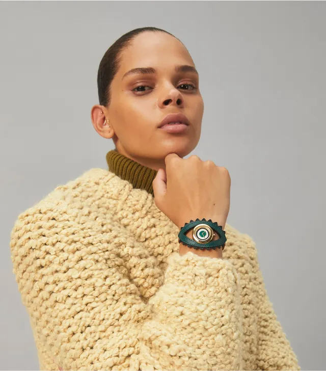 Tory Burch Evil Eye Bangle Watch Gold Tone Ivory 25 MM The Summit