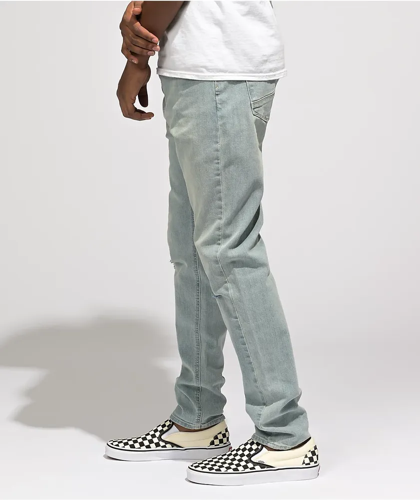 Light wash tapered jeans sales