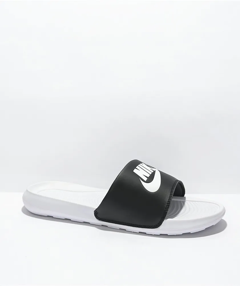 black and white mismatch nike slides