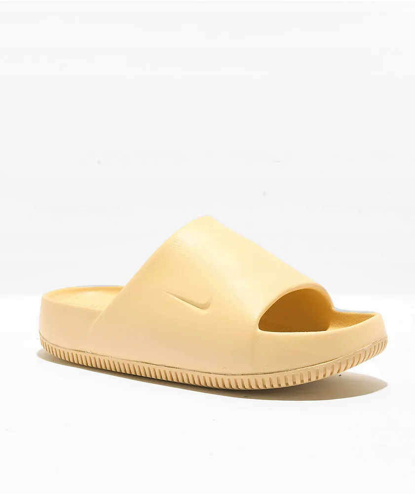 Nike swoosh slides top