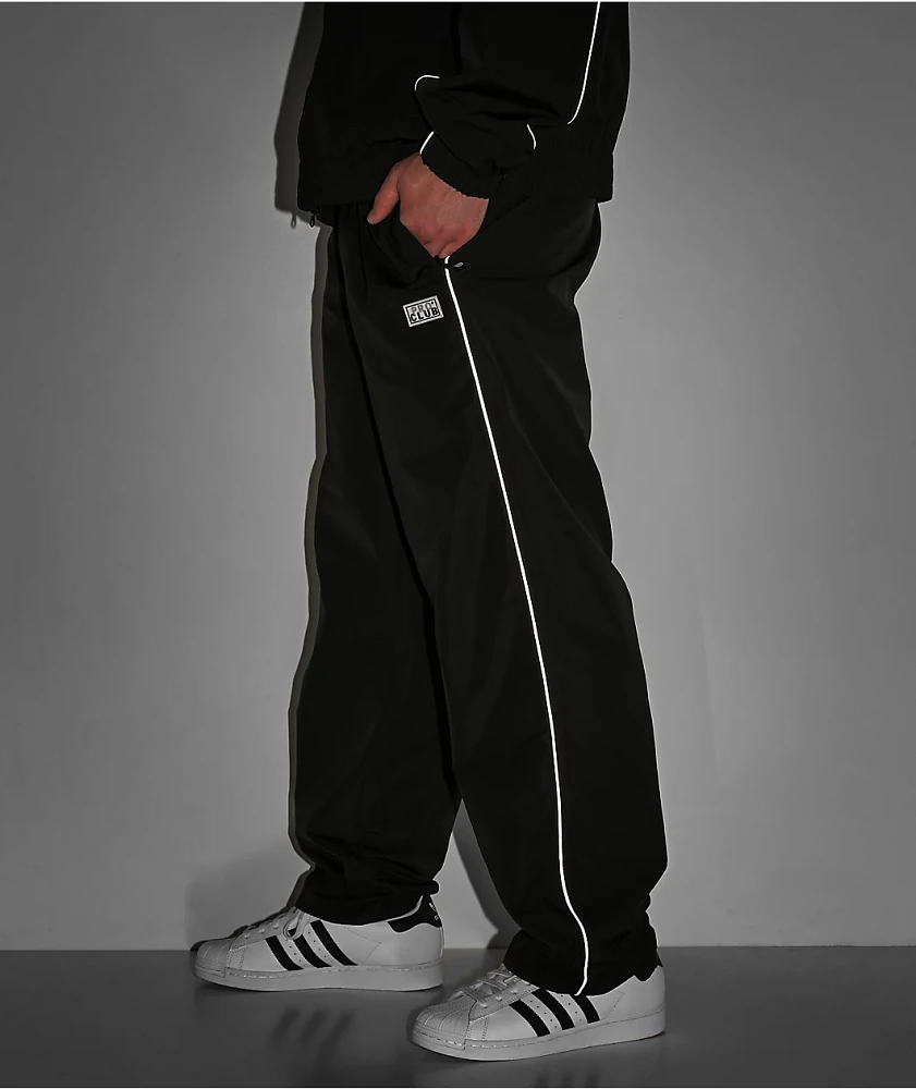 Black on black track pants on sale