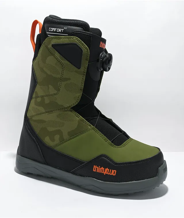 Green snowboard top boots