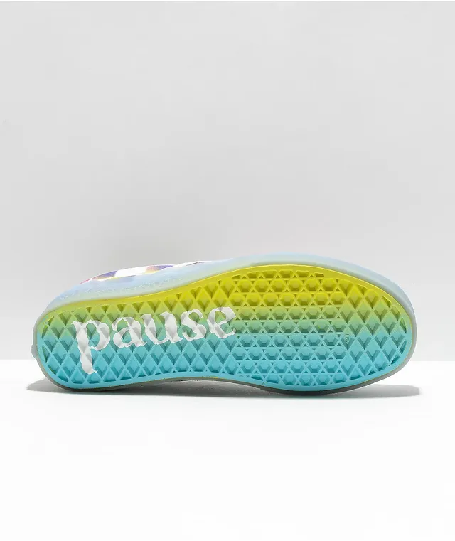 White slip on new arrivals vans with rainbow bottom