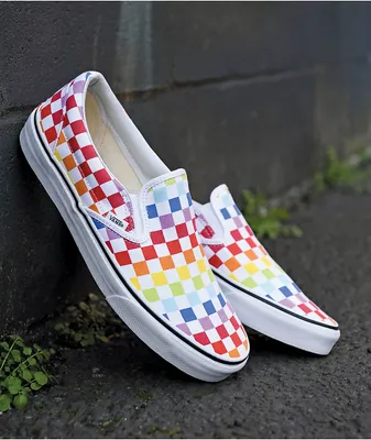 Vans rainbow checkerboard slip ons top