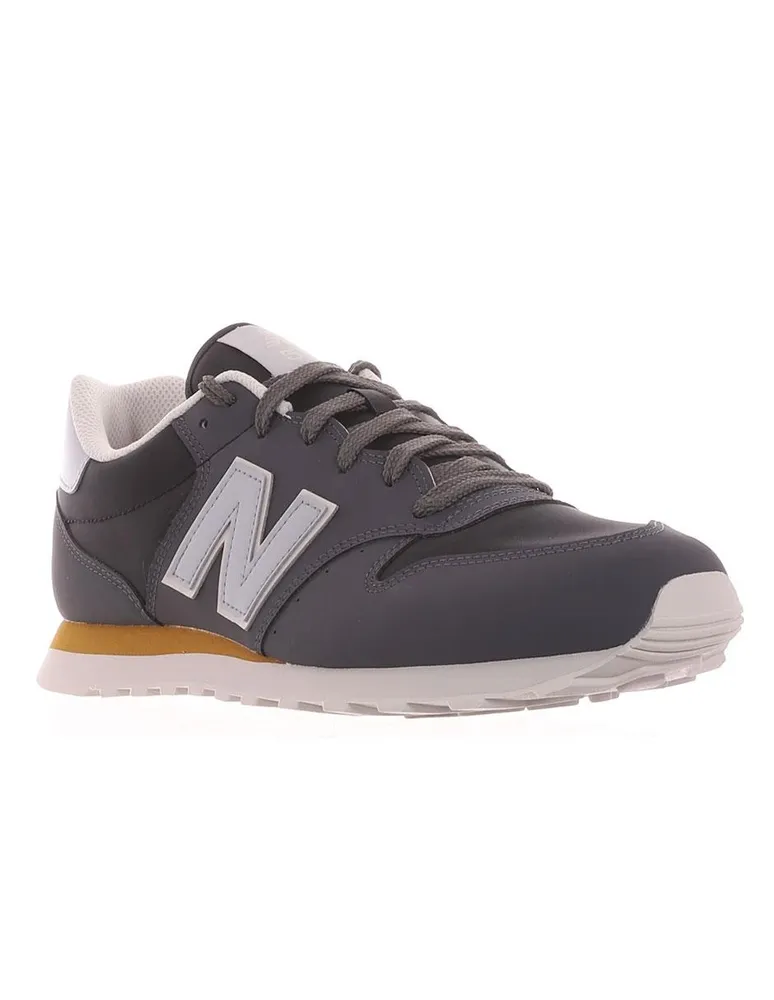 Tenis new balance top gm500 marrón