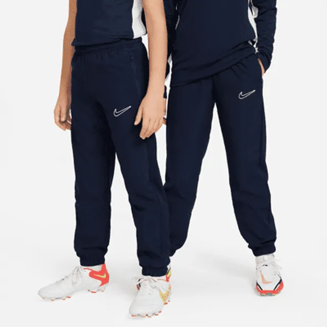 Nike dri fit tracksuit hotsell bottoms junior