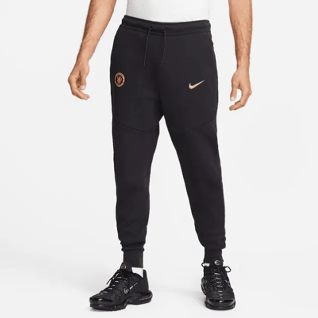 Nike tech fleece pants best sale black white