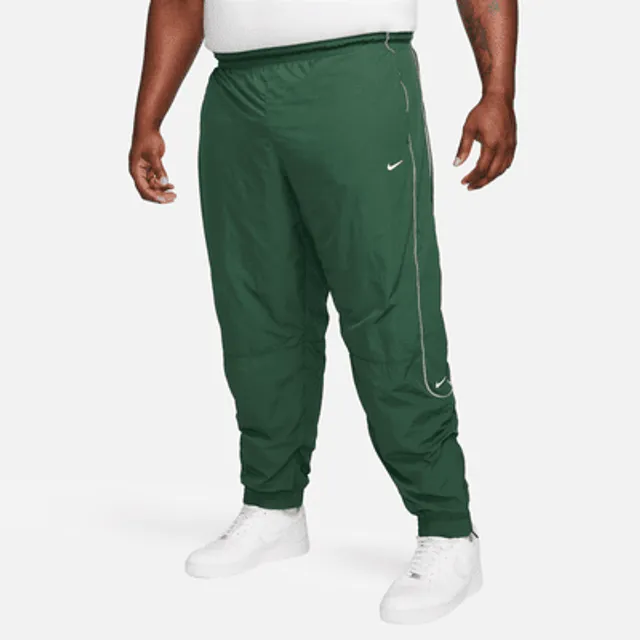 Green nike 2025 tracksuit bottoms