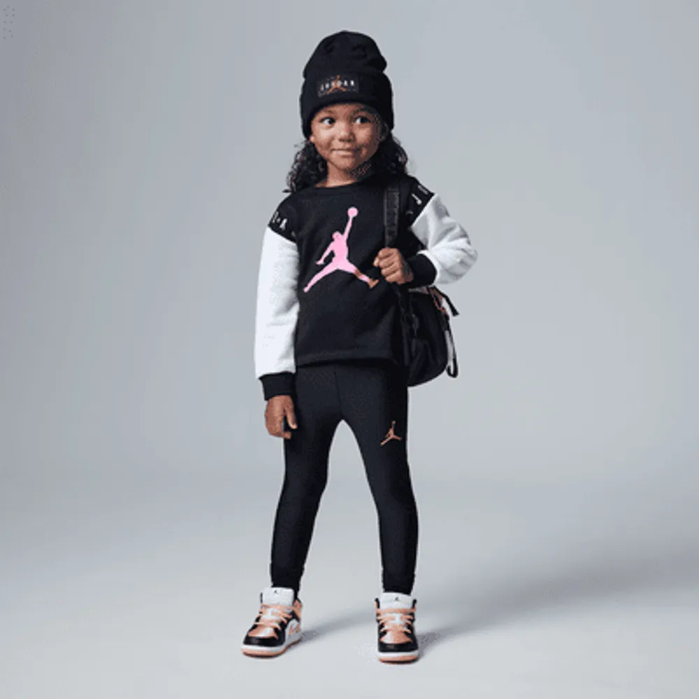 Baby girl in jordans store
