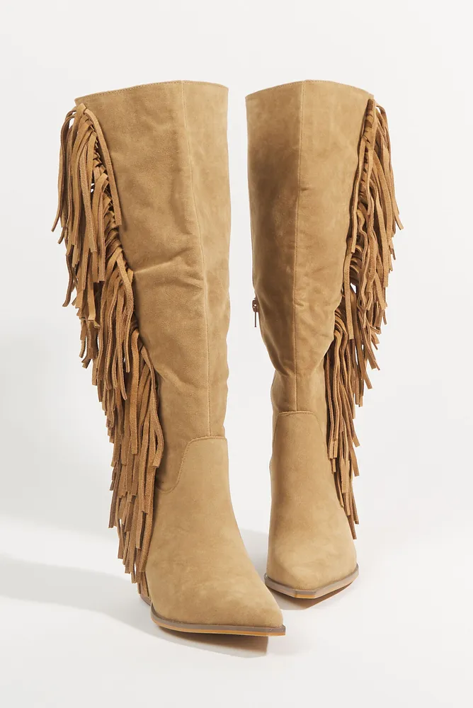 Boots with top designs on them