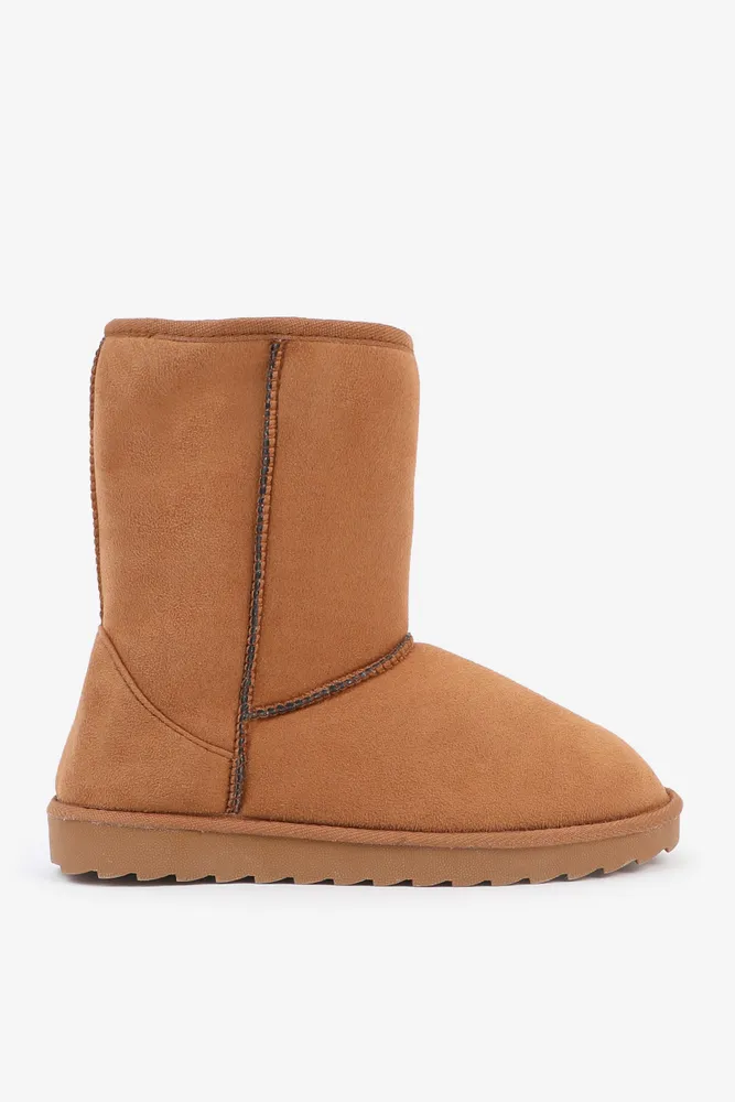 Fake sheepskin boots clearance