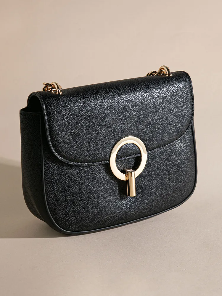 Crossbody purse with flap closure outlet
