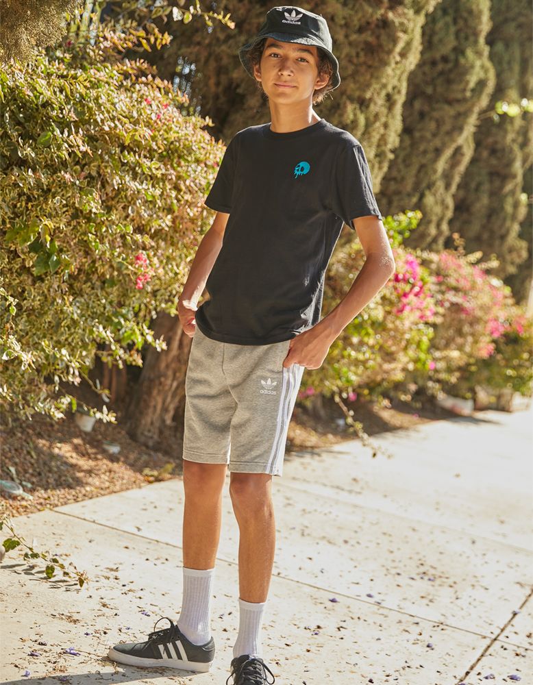 Boys in adidas shorts shop